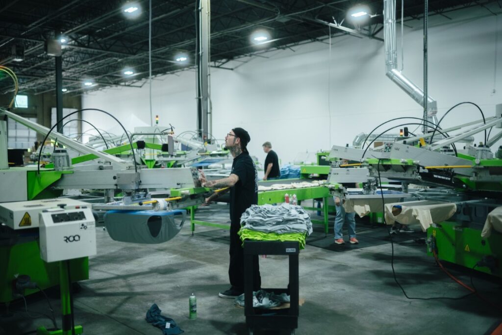 ROQ automatic screen printing press running a production order in Naples, FL